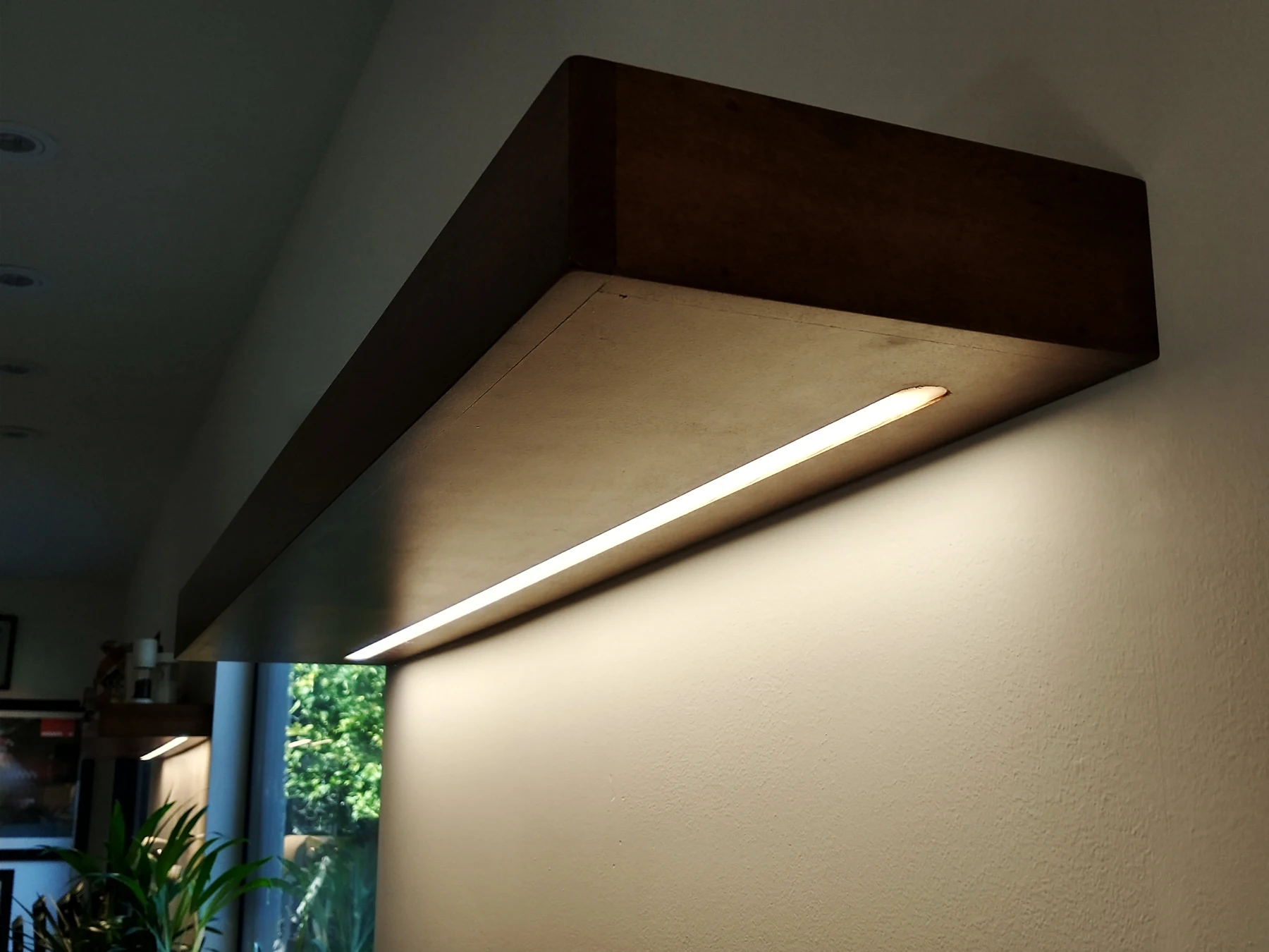 Under-shelf lighting in a completed kitchen