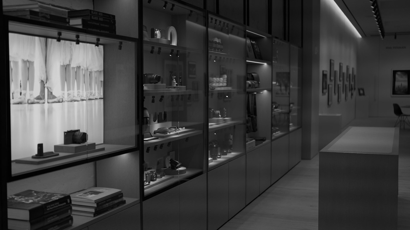 Museum gallery with glazed illuminated display cases