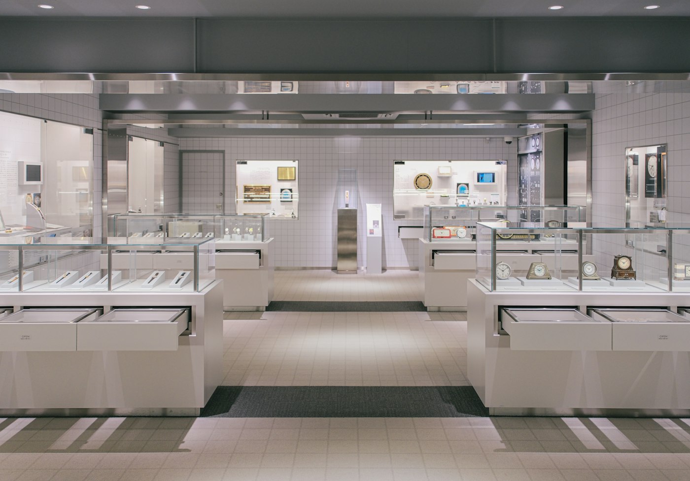 Retail interior with repeated glass jewellery display cases
